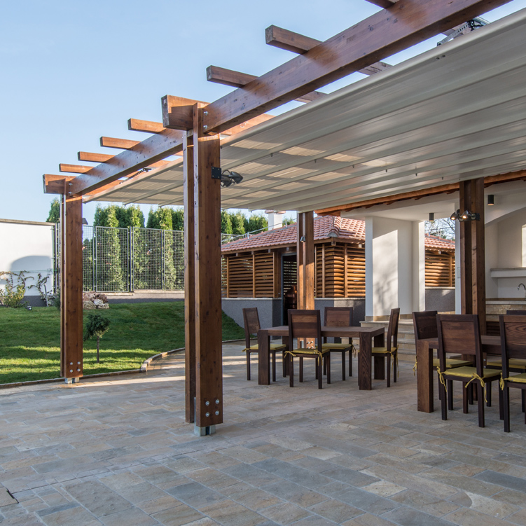 large pergola over outdoor kitchen