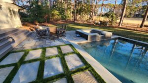 artificial turf next to pool 