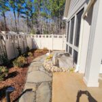 water feature next to permeable paver walkway