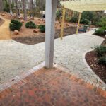 New curved flagstone patio and pergola